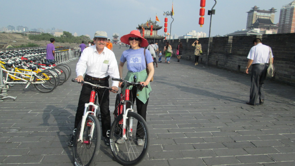 Jack and Beverly bike on top of the old City Walls, Xi'an City.