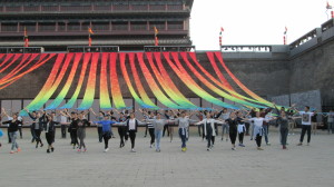 Practicing for National day dance performance by Xi'an old city walls